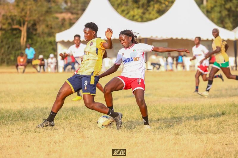 Fighting for the ball on grass